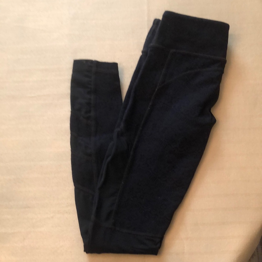 Vimmia Black texturized leggings; sheer on the sides; some pills along the seams